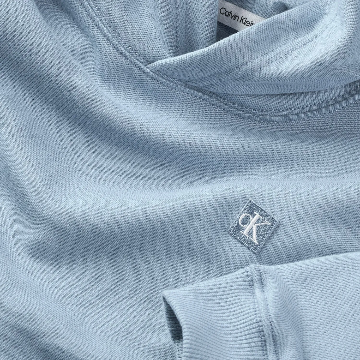 Calvin Klein Faded Denim Monogram Mini Badge Hoodie